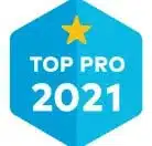 A blue hexagonal badge with a yellow star at the top. The text "TOP PRO 2021" is centered in white.