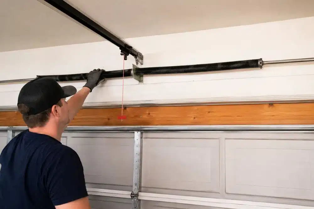 replace one garage door spring or both
